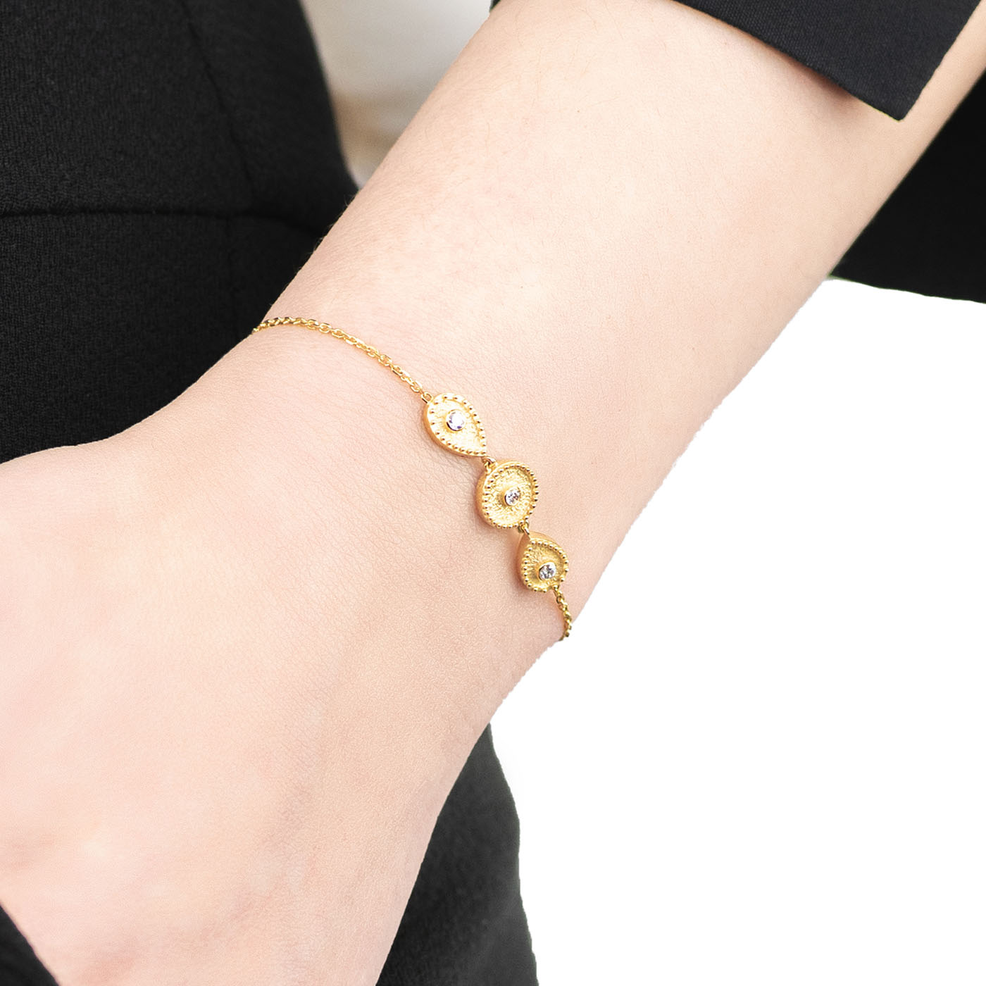 Gold geometric bracelet with diamonds